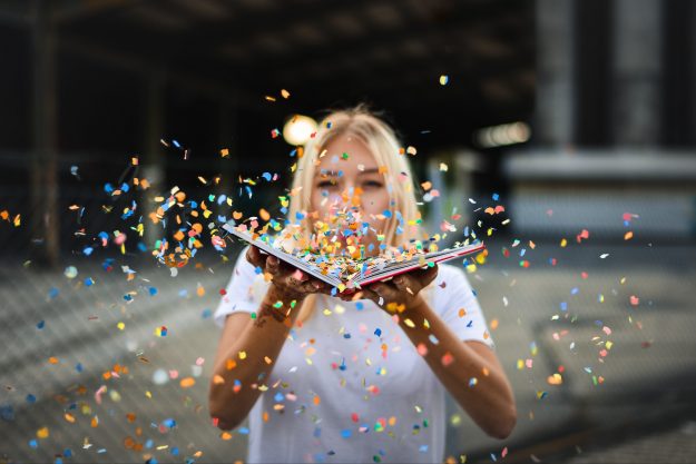 Happy woman depicting successful culture in mergers and acquisitions | Fifth Chrome