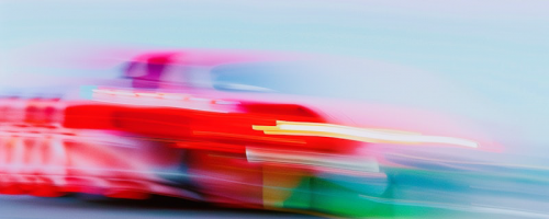 Red-Race-Car-in-Motion Red-Race-Car-in-Motion